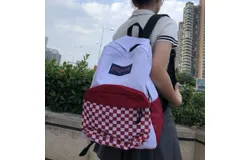 JanSport Cross Town Backpack 16&period;5" x 12&period;5" x5&period;5" - Simple Bag for Everyone with 1 Main Compartment&comma; Front Utility Pocket - Premium Class Accessories - White with red and white grid