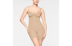 Skims Seamless Sculpt Low Back Mid Thigh Bodysuit In Clay