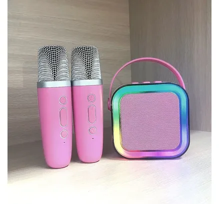 Mini Karaoke Glistenwing con 2 Micrófonos Inalámbricos y Cambiador de Voz, Altavoz Portátil Bluetooth con Luces para Todos los Smartphones Rosa Rosado